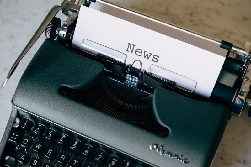 Photo of a typewriter with the word "News" typewritten on a page