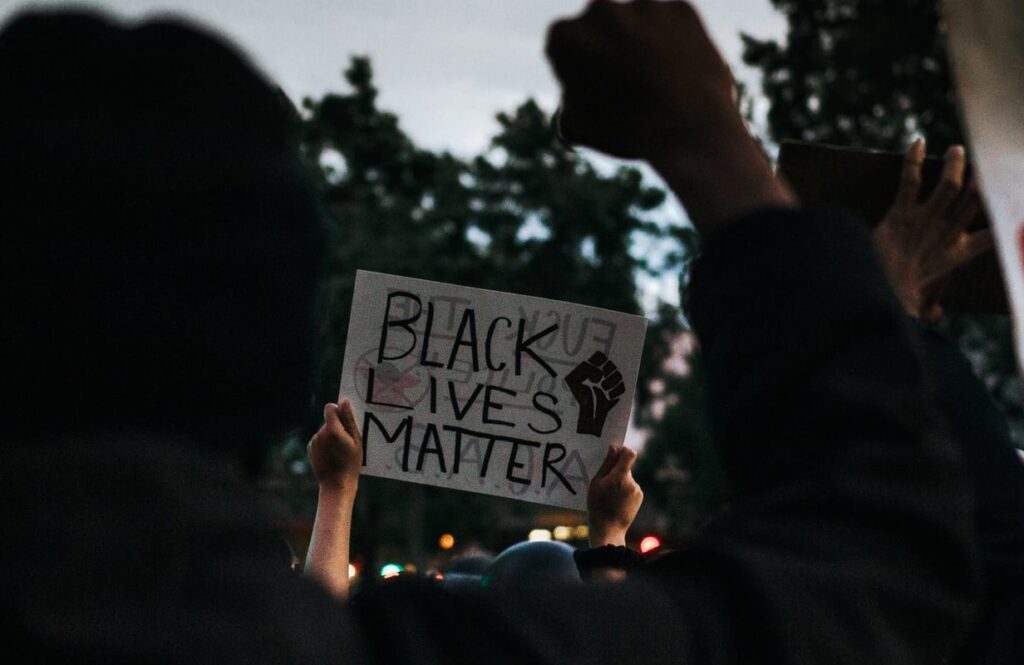 Photo of a Black Lives Matter sign at a protest.