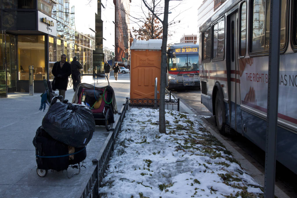 Homeless Persons Belongings Outside of Warming Bus