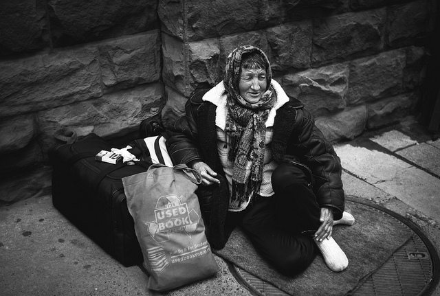 a photo of a homeless woman with a big smile