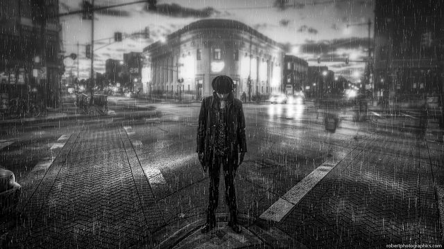 a photo of a man under the rain