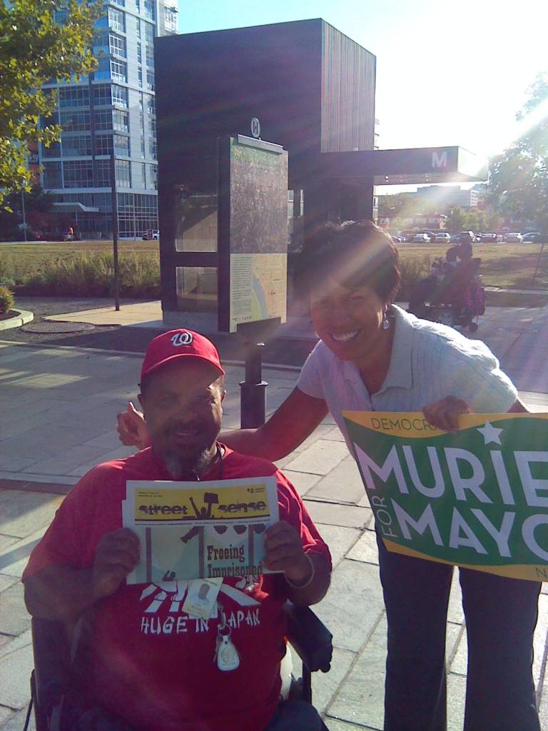 Picture of Street Sense vendor with Muriel Bowser
