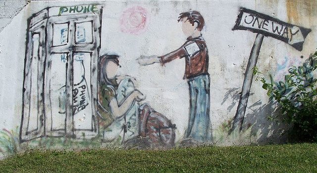 Illustration of a man holding out his hand to a homeless woman.