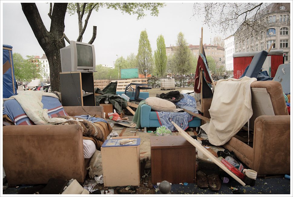 Photo of household belongings--couches TVs etc--after an eviction.