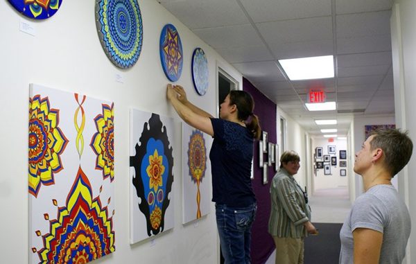 Photo of artists setting up for Artomatic opening day