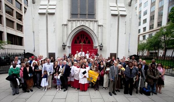 Photo of a gathering in front of the Church of the Epiphany