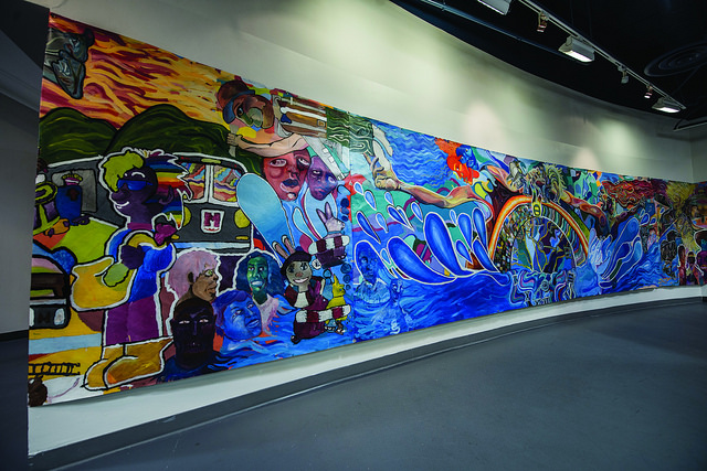 Photo of a mural painted by DC youth showing the potential of the bridge park.