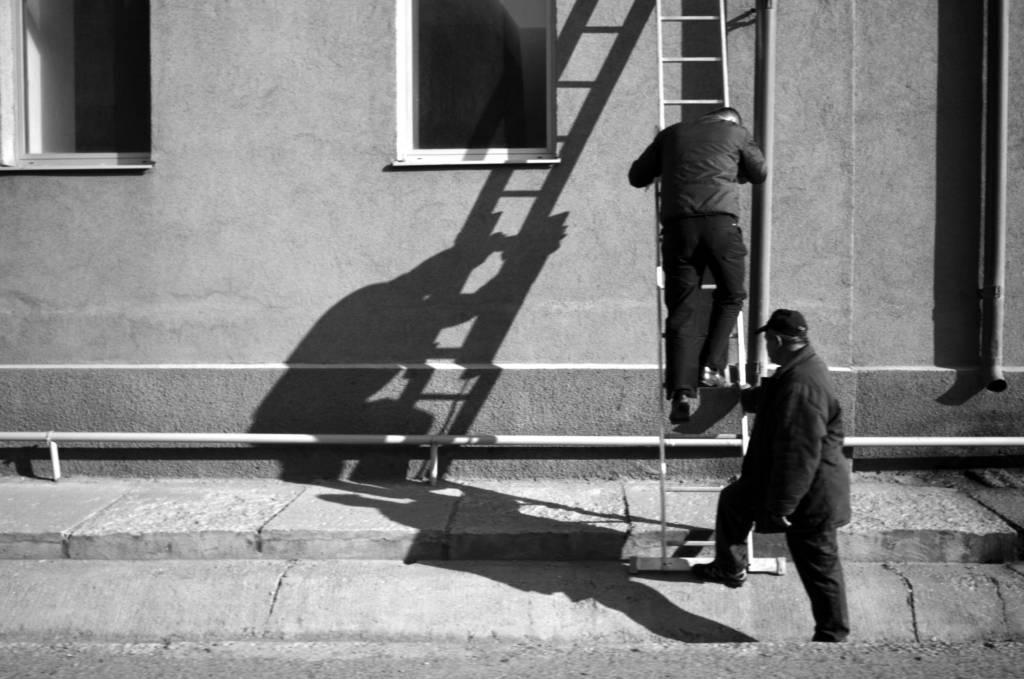 A man climbs a ladder