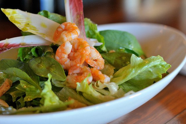 A photograph of a seafood salad.