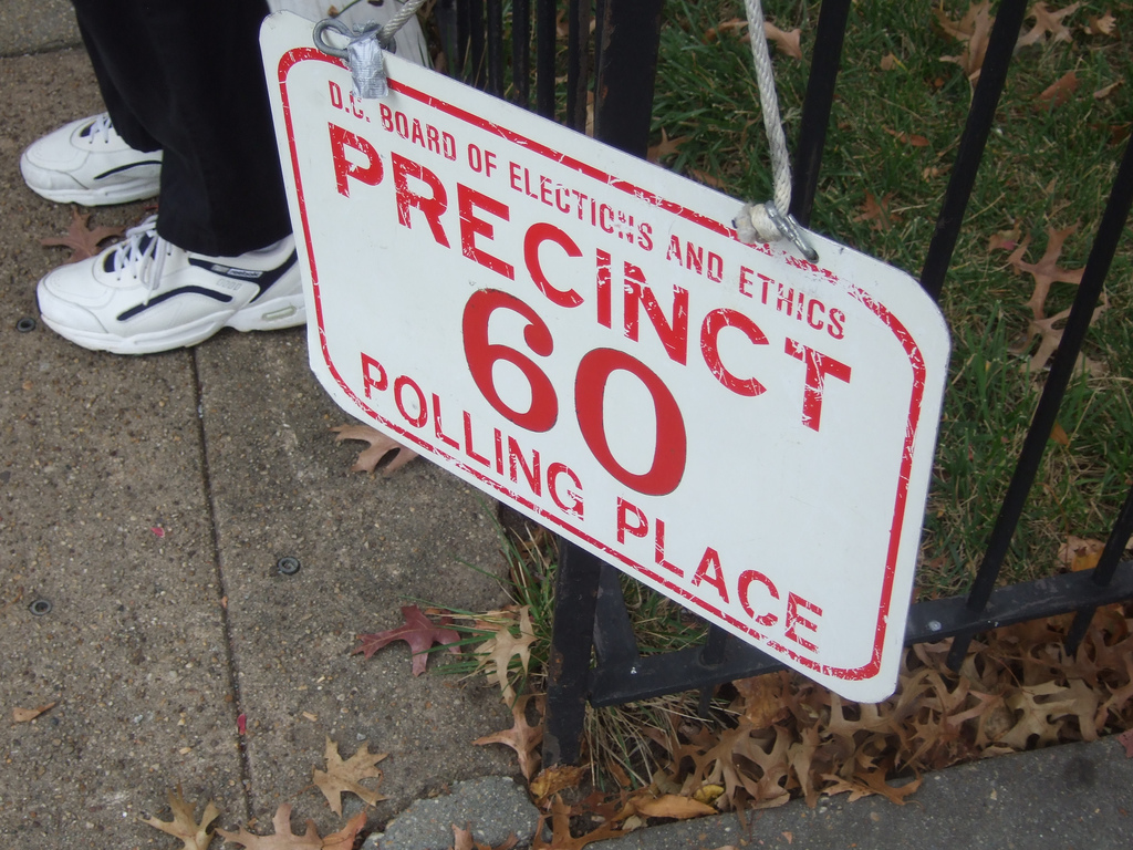 A picture of a sign reading "DC BOARD OF ELECTIONS AND ETHICS PRECINCT 60 POLLING PLACE."