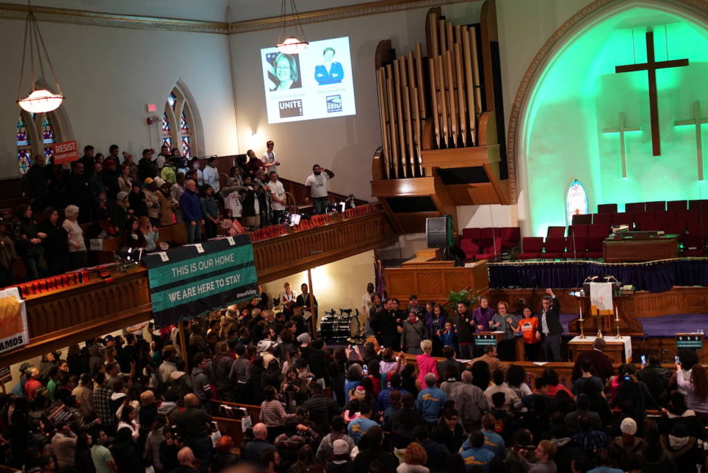 Photo of people rallied inside the Metropolitian Methodist Episcopal Church on MLK Day