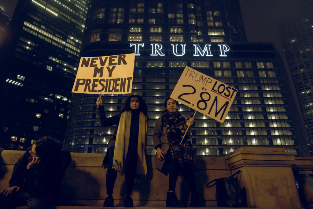 Protestors rally outside Chicago's Trump hotel following President Trump's inauguration.