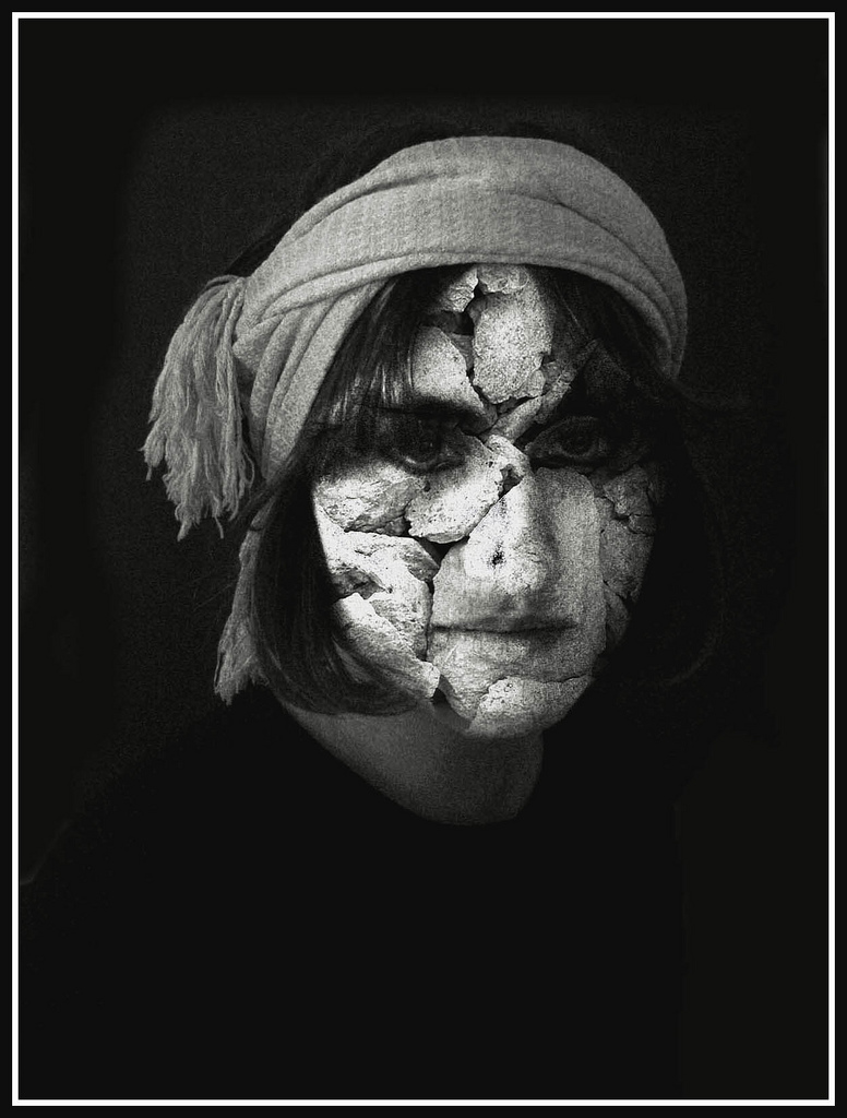 A photo of a woman's face shattered.