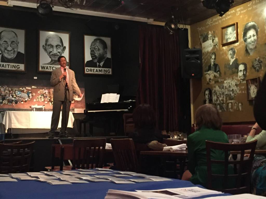 Job Counselor Lawrence Taylor speaks at Jubilee Jobs' March 26 event in the 14th Street NW Busboys and Poets.