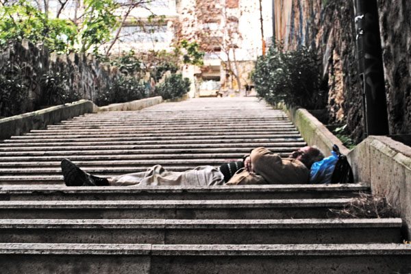 Man sleeping on the stairs