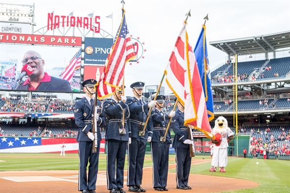 Members of the Air Force Reserve's 459th Air Refueling Wing Honor Guard prepares to present the colors at Nationals Park Stadium before the Washington Nationals vs. Philadelphia Phillies game in Washington, April 17, 2015. The Honor Guard was invited to present celebration of black heritage day and in honor of the Air Force Reserve's 67th birthday.