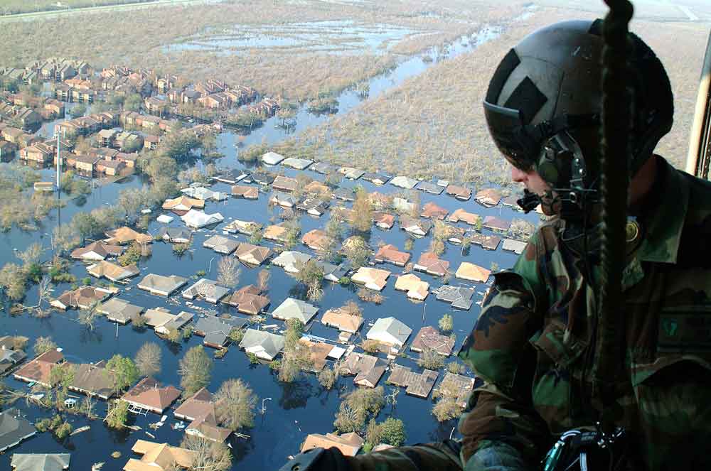 Tech. Sgt. Keith Berry, a pararescueman with the 304th Rescue Squadron from Portland, Ore., searches for survivors in the aftermath of Hurricane Katrina.
