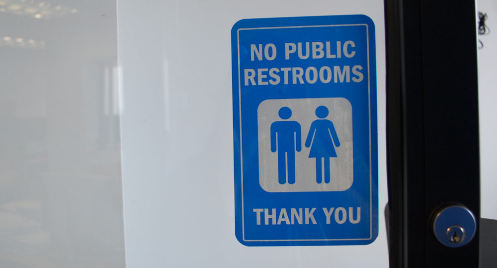 Photo of a sign that says "no public restrooms, thank you"