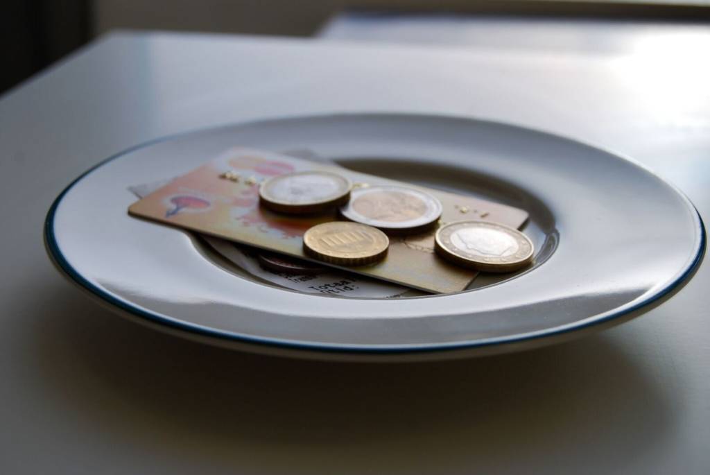 A photo of money on a plate