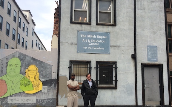 Monsoor Ali, a WildTech-CCNV leader, and founder Lou August stand in front of the shelter at 2nd and D Streets NW