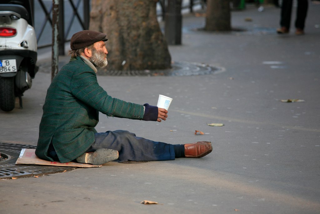 a photo of a man experiencing homelessness.