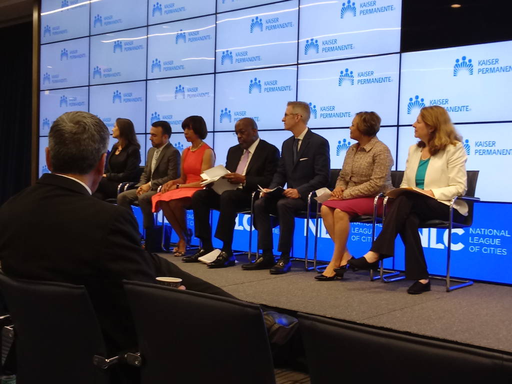 A panel of mayors, CEOs, and homelessness experts convened at the Kaiser Permanente Capitol Hill Medical Center for a May 18 press conference.
