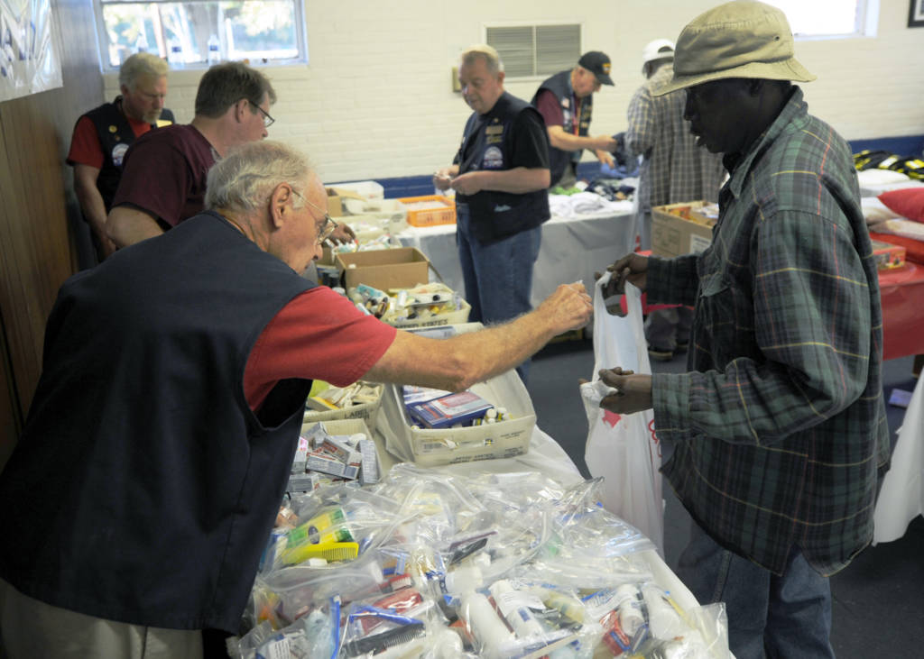 Members from the Charleston Elks Lodge 242 pass out hygiene products to homeless veterans and civilians at the 11th annual Stand Down Against Homelessness Oct. 29, 2010, at North Charleston Armory Park, S.C. The Benevolent and Protective Order of Elks is an American fraternal order and social club founded in 1868.
