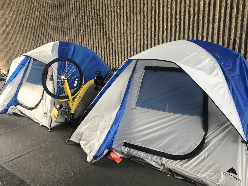 Photo of two tents and a bicycle near Union Station