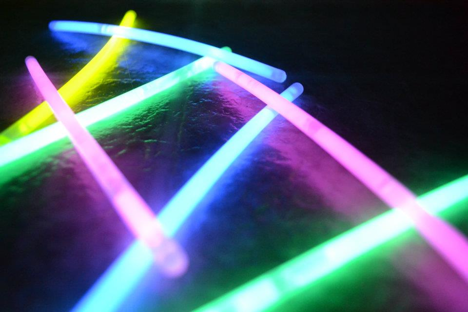 A photograph of colorful glow sticks.