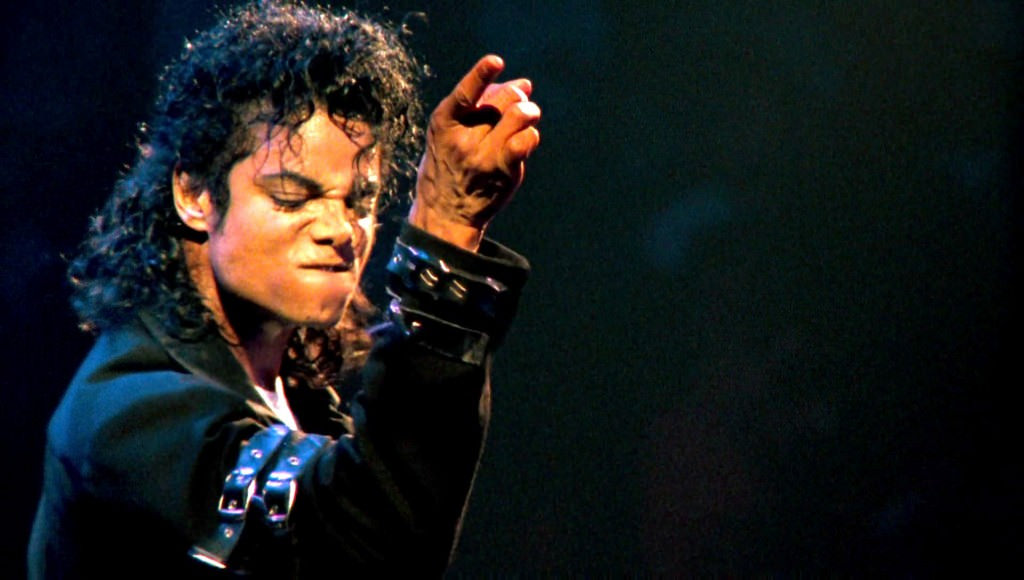 A close-up photograph of Michael Jackson in performance.