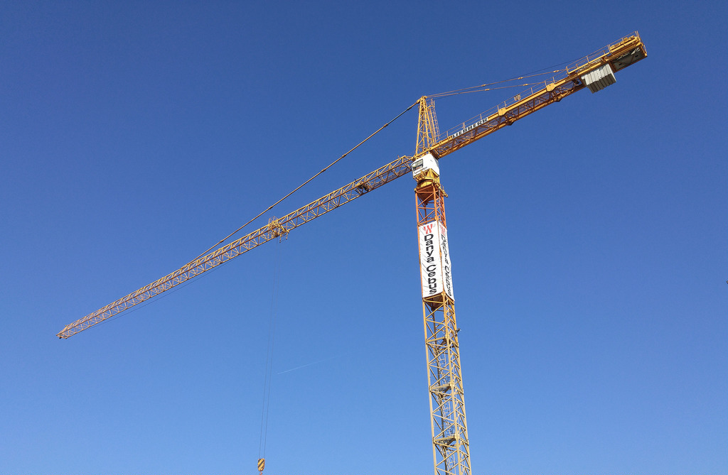 Construction crane of a blue sky