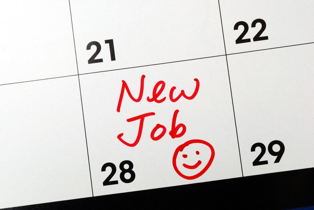 A photograph of a calendar date saying "new job."
