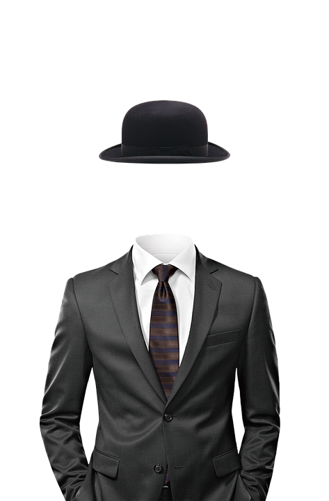 photo of a suit and hat against a white background.