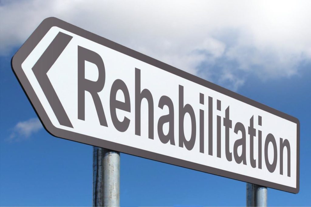 Photo of a sign that says "rehabilitation"