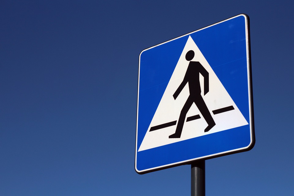 A photo showing a walking sign.