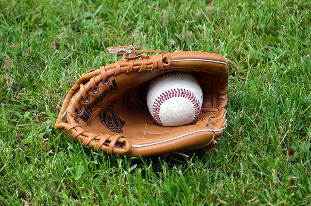 Image of a baseball in a glove