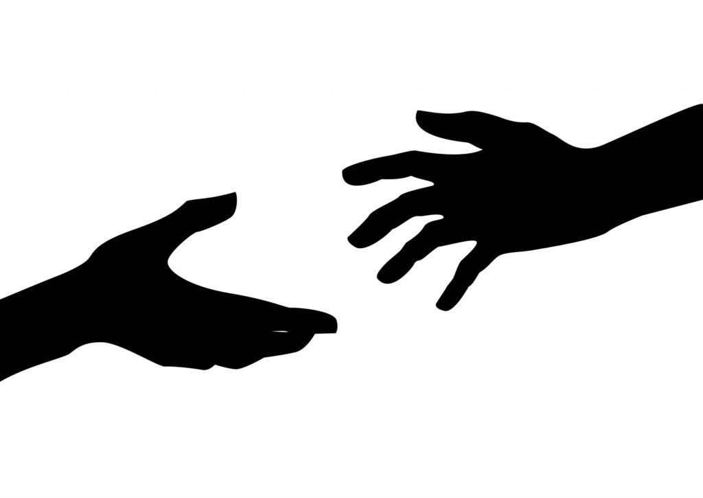 An image of the silhouettes of two hands extended to each other.