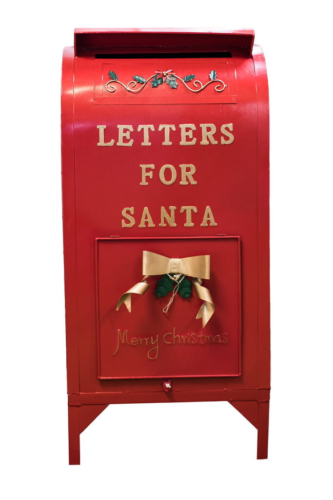 A red mailbox with the words Letters For Santa