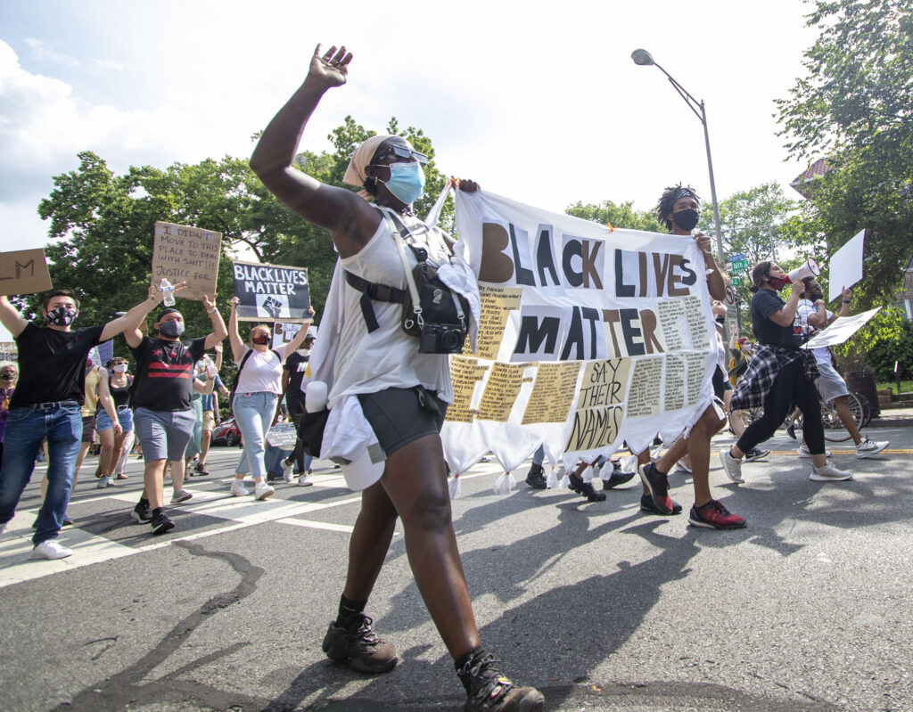 Protesters with a Black Lives Matter banner