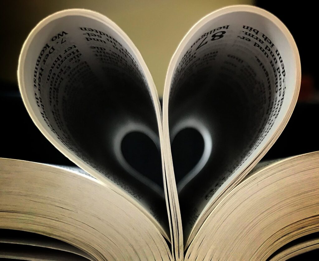 Photo of book with pages folded into a heart shape