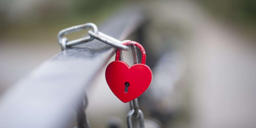Photo of red padlock in the shape of a heart