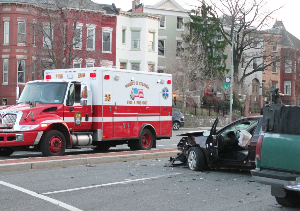 Photo of a D.C. FEMS ambulance at a car accident.
