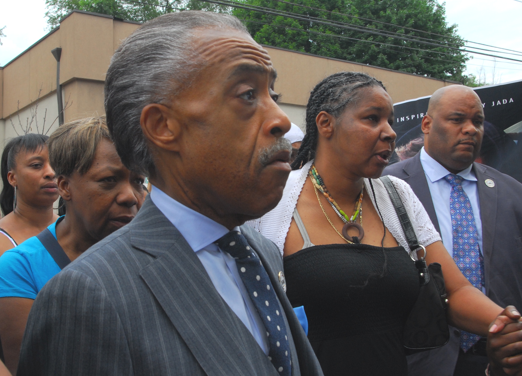 Photo of Rev. Al Sharpton of the National Action Network with Esaw Garner, widow of Eric Garner, at a 2014 protest in the Staten Island neighborhood where Eric Garner died while in police custody.