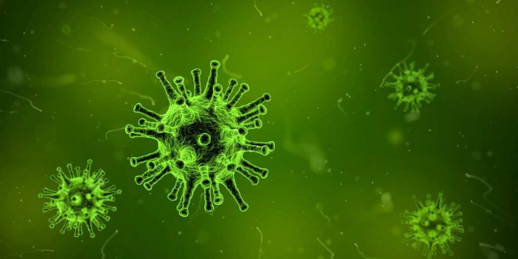Green virus particles on a green background.