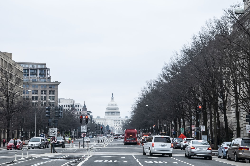 A photo of the street leading up to the United States Capitol Building.