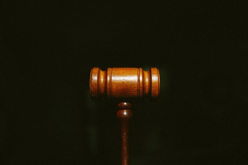 A gavel sits on a table.