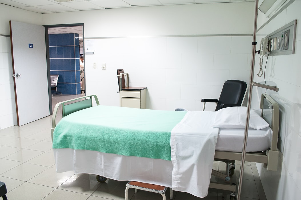 A photo of an empty hospital room.