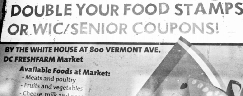 Photo of a flyer at the White House Farmer's Market advertising double coupons offered.