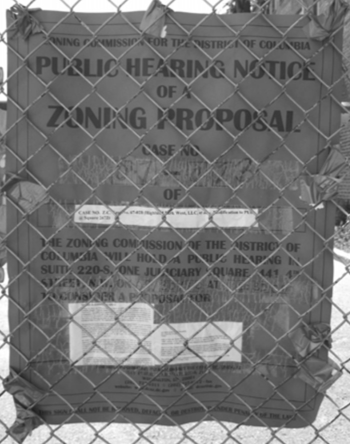 A photo of zoning hearing notice outside the La Casa shelter.