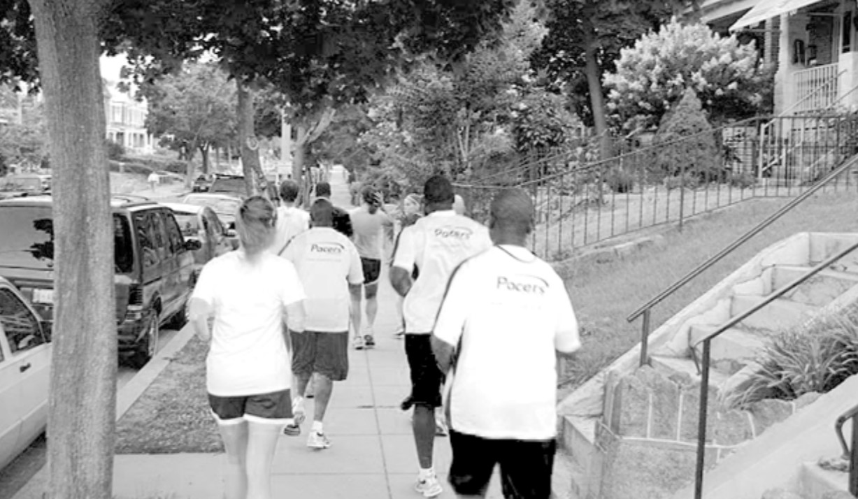 Photo of participants running in a Back on My Feet fundraiser.